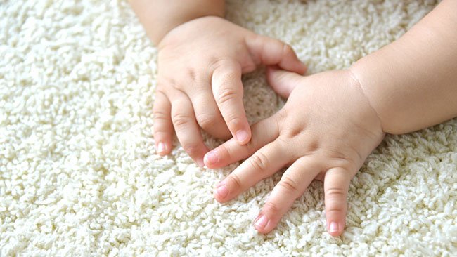 Baby's hands on Carpet
